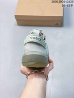 Rear view of the sneaker with a heel pull tab and Terrex branding