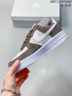 Side profile showing brown and white panels, a white Swoosh and white outsole; image overlay states 36–45.5 and JD972A02.