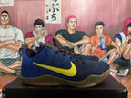 Side view showing the navy knit-style upper, yellow Swoosh and translucent brown-toned outsole.