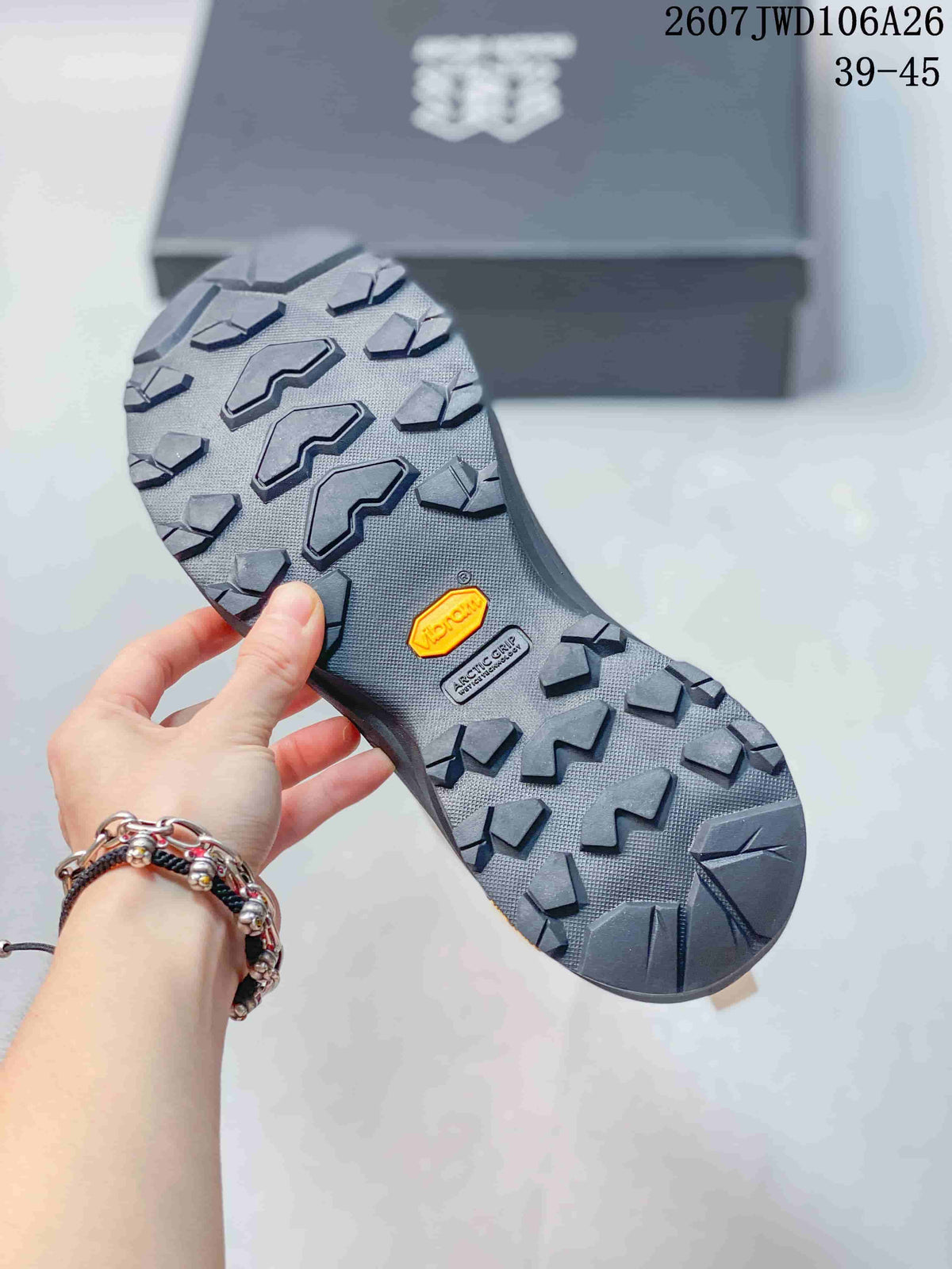 Close view of the hiking shoe outsole showing a deep lug pattern and visible Vibram branding.