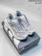 Pair of Adidas Holo Peak low-top trail running shoes in light gray and pale blue, shown on a shoebox