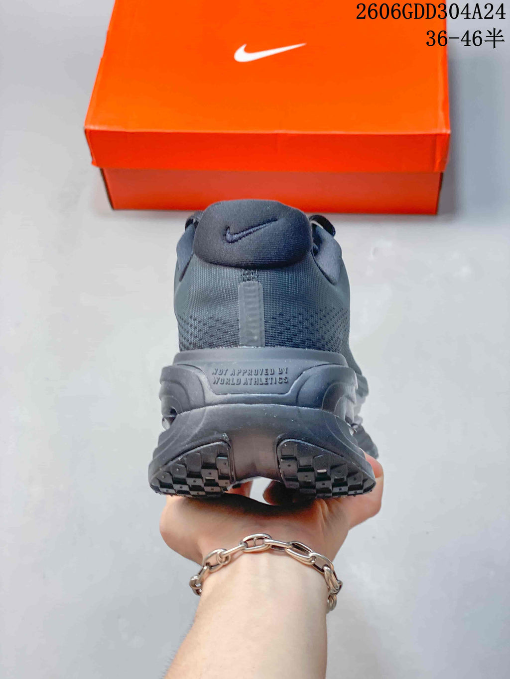 Rear view of a black Nike Vomero Premium SP shoe showing the heel and outsole
