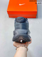 Rear view of a black Nike Vomero Premium SP shoe showing the heel and outsole