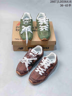 Front view of green and brown pairs displayed together, with white and tonal laces and visible Miu Miu and New Balance branding.