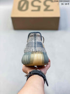 Rear view showing the knit-look heel and translucent ribbed outsole.