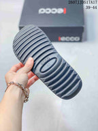Close-up of the dark ridged outsole of an ECCO sandal; size 40 is visible in the outsole marking.