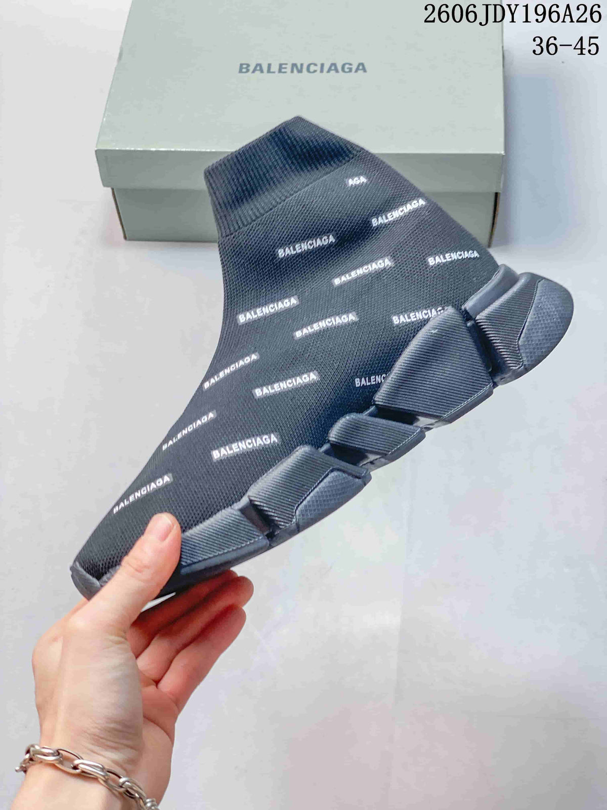 Side view of a dark gray sock sneaker showing the repeated logo pattern and segmented outsole.