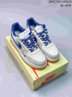 Pair of white, grey and blue Nike Air Force 1 sneakers displayed on a Nike shoe box, with the style code and size range visible at the top.