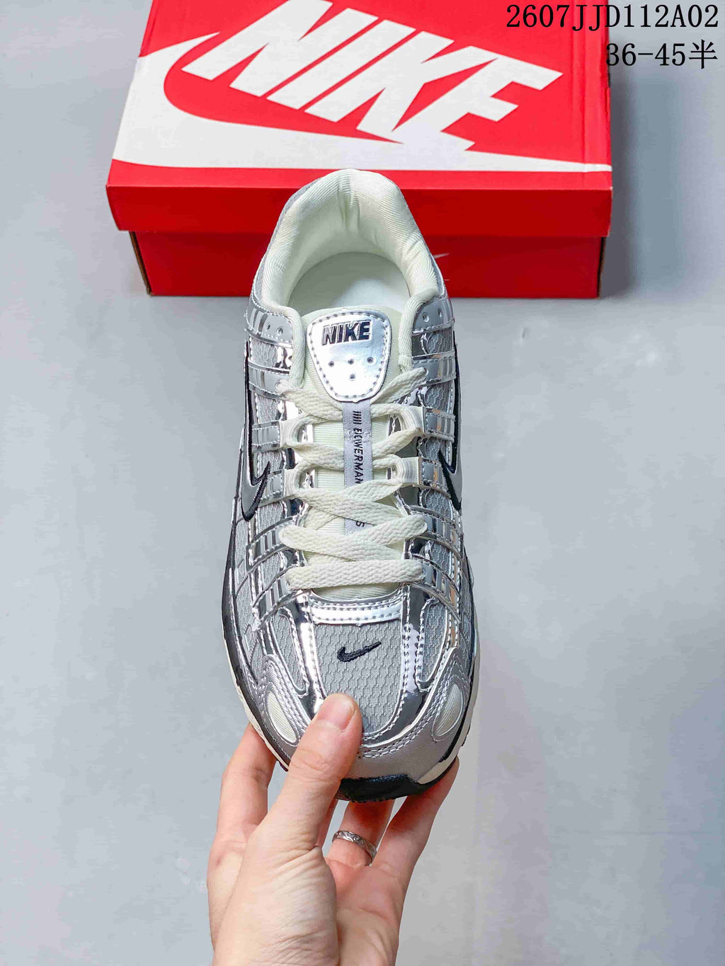 Top view of a silver-toned Nike P-6000 sneaker with lace-up closure