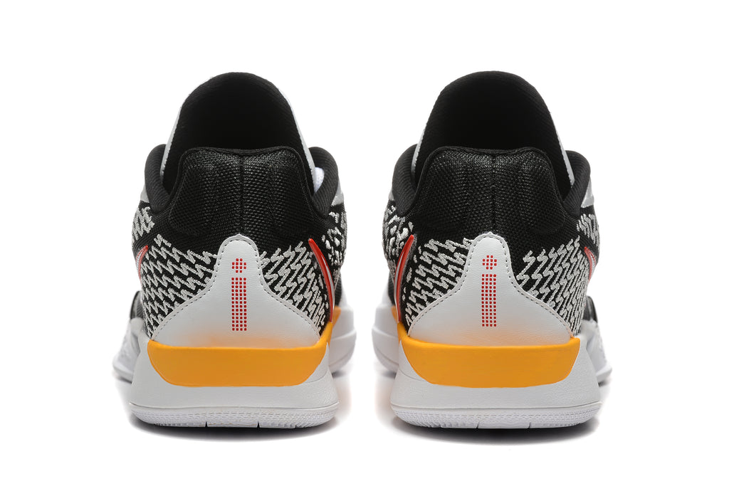 Rear view showing the patterned heel panels and orange heel accents