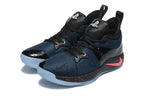 Front three-quarter view of the black and navy Nike PG 2 shoes