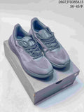 Grey Descente EASE WIRE sneakers displayed on a shoe box, with style code and size range visible above.
