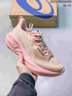 Light beige and pink ASICS NOVABLAST 5 LE running shoe