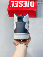 Rear view of a white and dark gray high-top sneaker