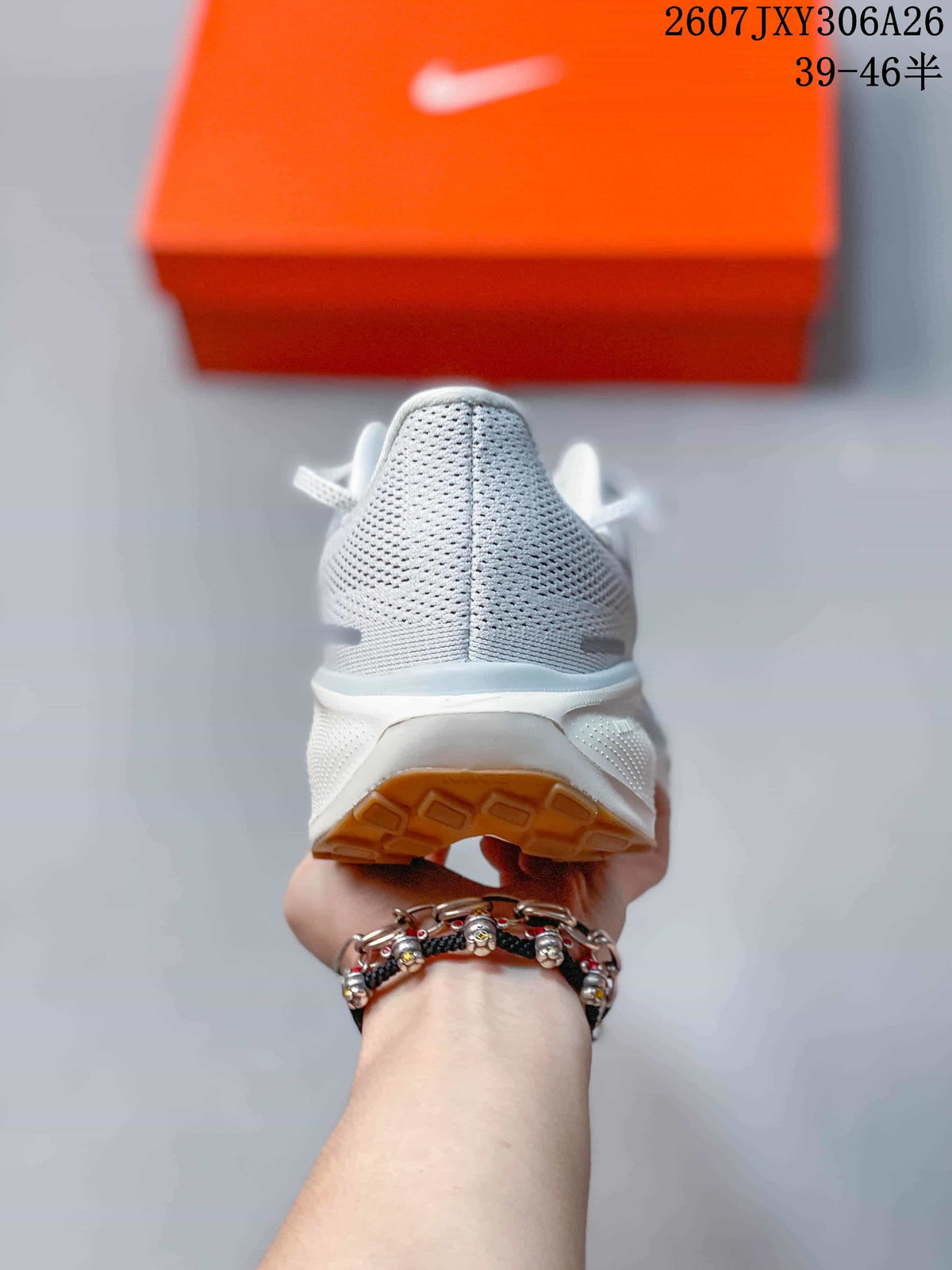 Rear view showing the padded heel, mesh-like upper and gum outsole.