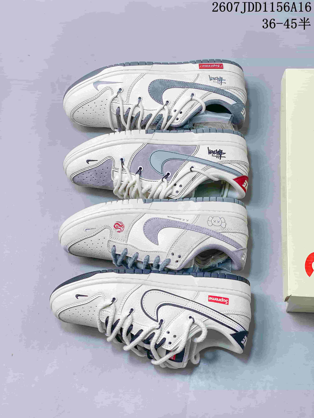 Top-down view of several photographed sneaker designs arranged beside a shoe box, showing off-white uppers with grey or dark contrasting details.