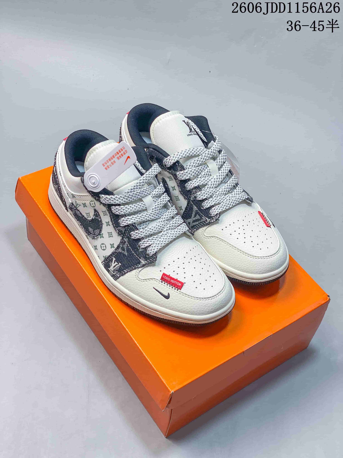 Pair of white and dark patterned low-top sneakers displayed on an orange box, with grey laces and a visible style code and size range.