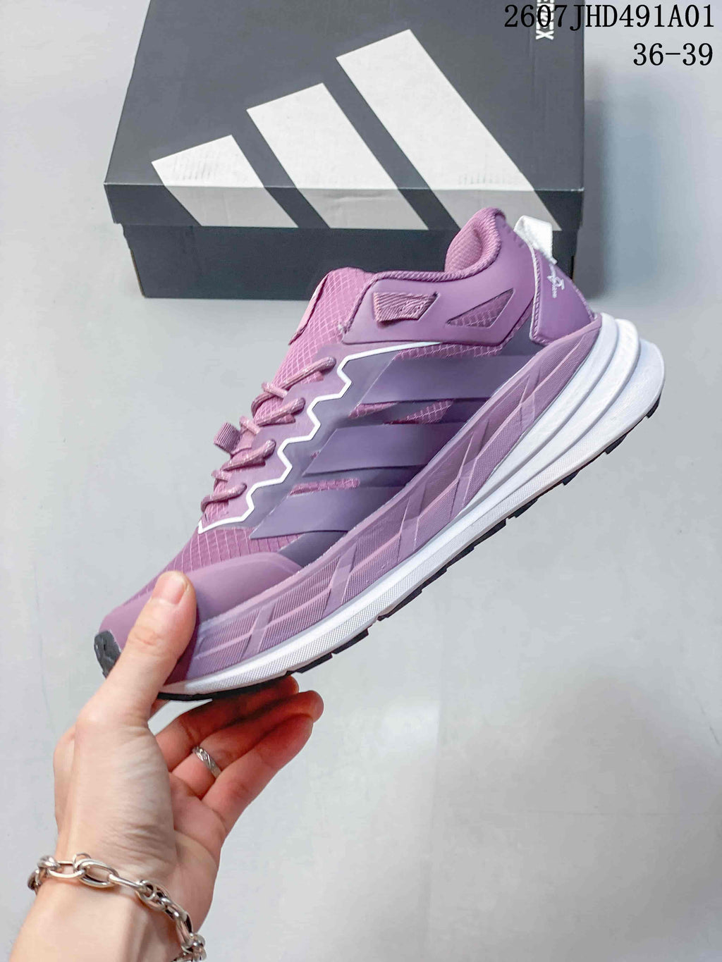 Side profile of the purple low-top sneaker