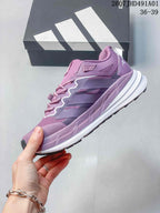 Side profile of the purple low-top sneaker