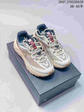 Pair of KAILAS low-top hiking shoes in off-white, gray, navy, and orange, displayed on a shoebox; image text shows style code 2607JVD230A20 and sizes 36–45 half sizes.