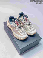Pair of KAILAS low-top hiking shoes in off-white, gray, navy, and orange, displayed on a shoebox; image text shows style code 2607JVD230A20 and sizes 36–45 half sizes.