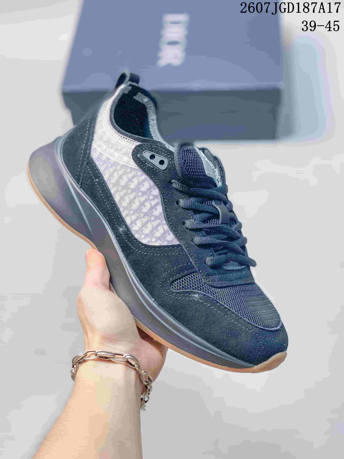 Black Dior B25 Runner sneaker with a translucent patterned side panel and gum-colored outsole edge.