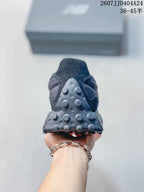 Rear view highlighting the textured lugged heel outsole