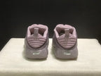 Rear view showing padded heels, pull tabs and embossed Nike details.