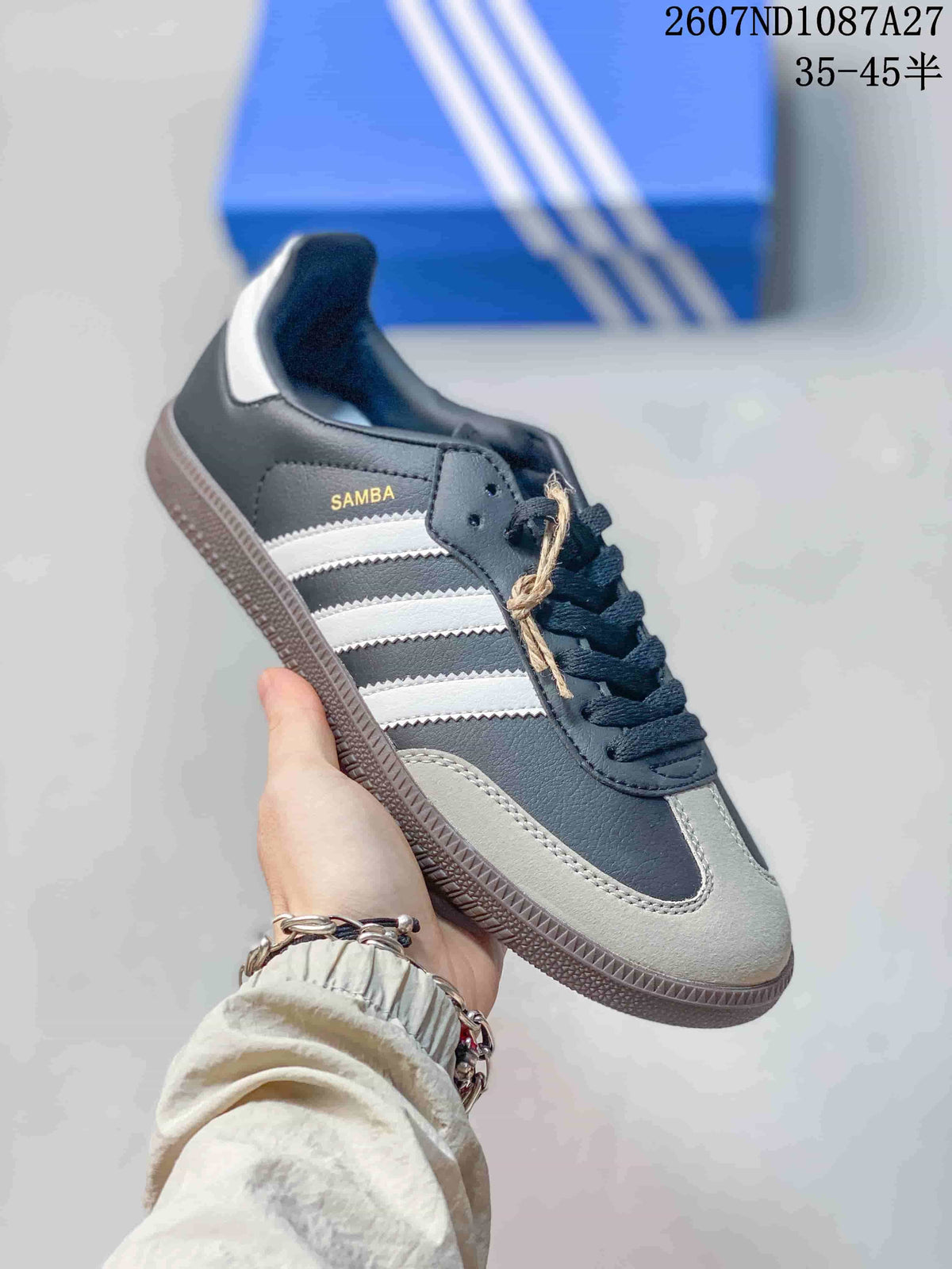 Black and white adidas Samba sneaker showing the side branding, laces and textured sole.