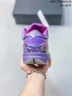 Rear view of the purple basketball shoe showing the Kobe-related heel detailing and translucent outsole.