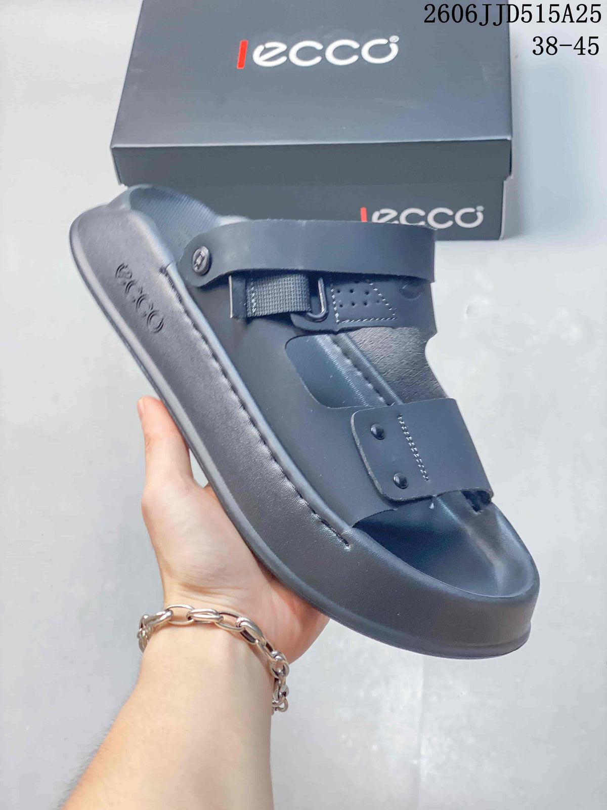 Close-up of a gray adjustable strap sandal showing its open toe, two straps, and molded footbed.
