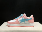 Side profile showing the low-top shape, light-blue star emblem, pink heel, and white midsole.