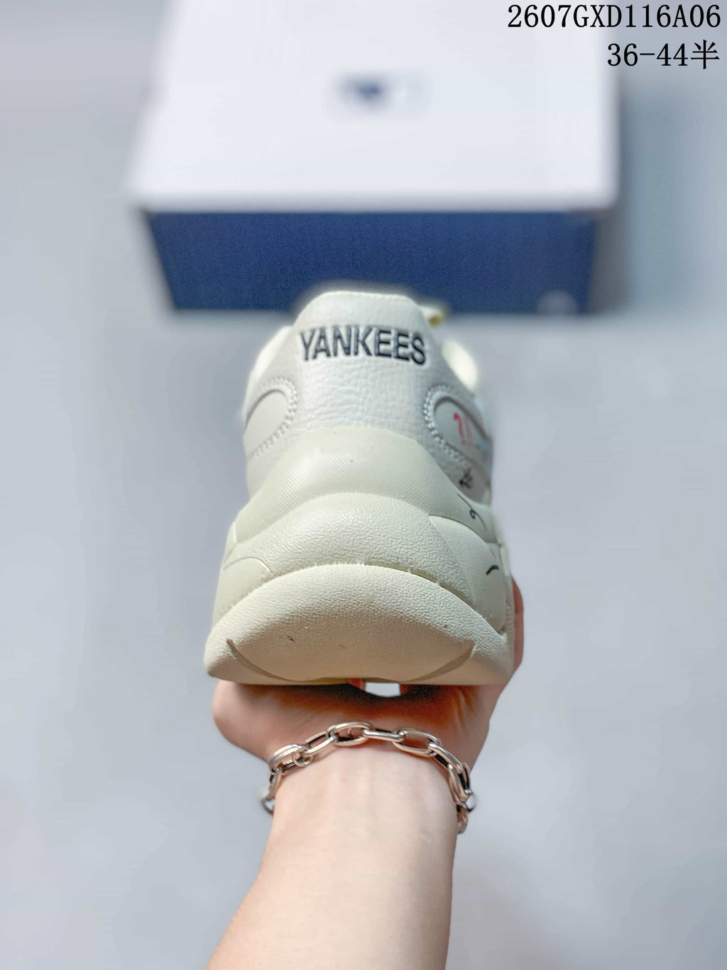 Rear view of the sneaker showing the padded heel and visible YANKEES text on the collar.