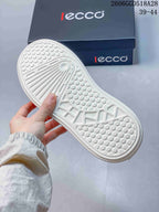 Close-up of the white sneaker outsole and its patterned tread