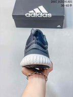 Rear view of the sneaker showing its heel and white midsole.
