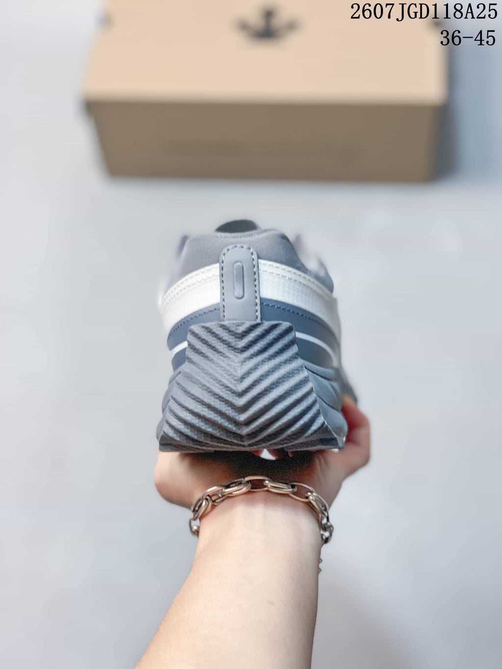 Rear view showing the layered heel and textured outsole of the sneaker