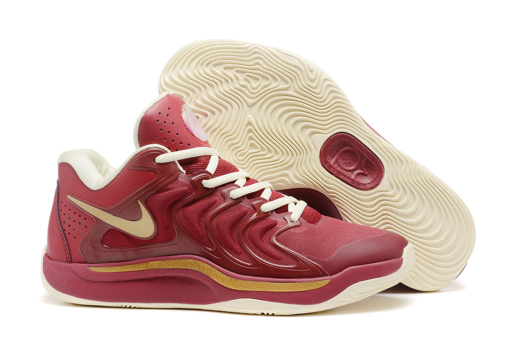 Red and gold Nike KD 17 basketball shoes with an off-white outsole.