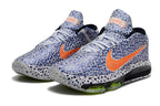 Pair of patterned blue and white Nike GT Hustle 3 shoes with orange accents.