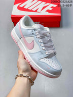 Angled view of the white, pale blue, and pink low-top sneaker