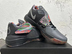 Basketball shoes displayed at an angle, showing the midfoot strap, multicolor accents, and translucent-looking outsole.