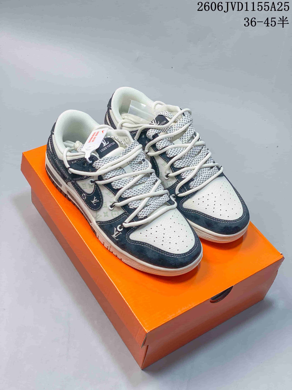 Pair of white and dark navy low-top sneakers with patterned side panels