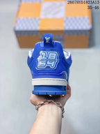 Rear view of a blue Louis Vuitton Trainer sneaker showing the branded heel panel, white midsole, and blue outsole.