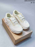 Pair of white On Cloudmonster 3 running shoes shown from above and at an angle