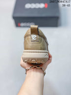 Rear view of an ECCO slip-on sneaker showing the heel pull tab, stitched heel panel, and outsole profile.
