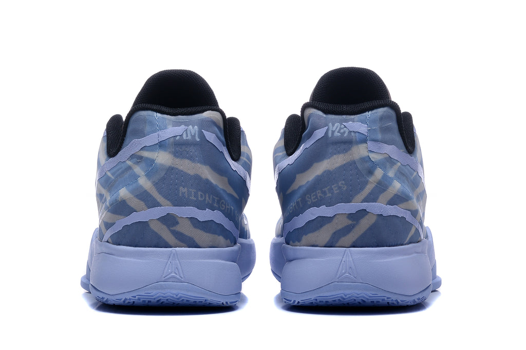 Rear view showing patterned heels and Kobe-style details