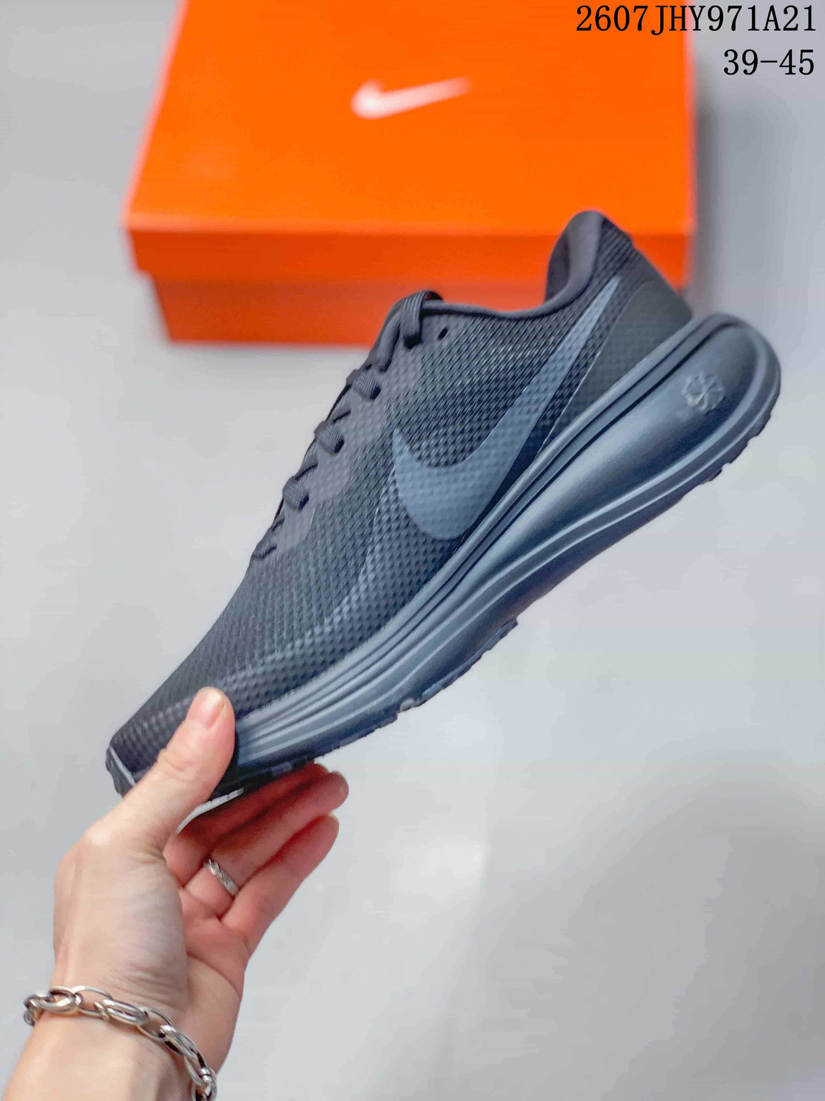 Side profile of the black Nike running sneaker showing the textured upper, Swoosh branding, laces, and cushioned sole.