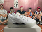 Side view showing the patterned panel and sculpted sole