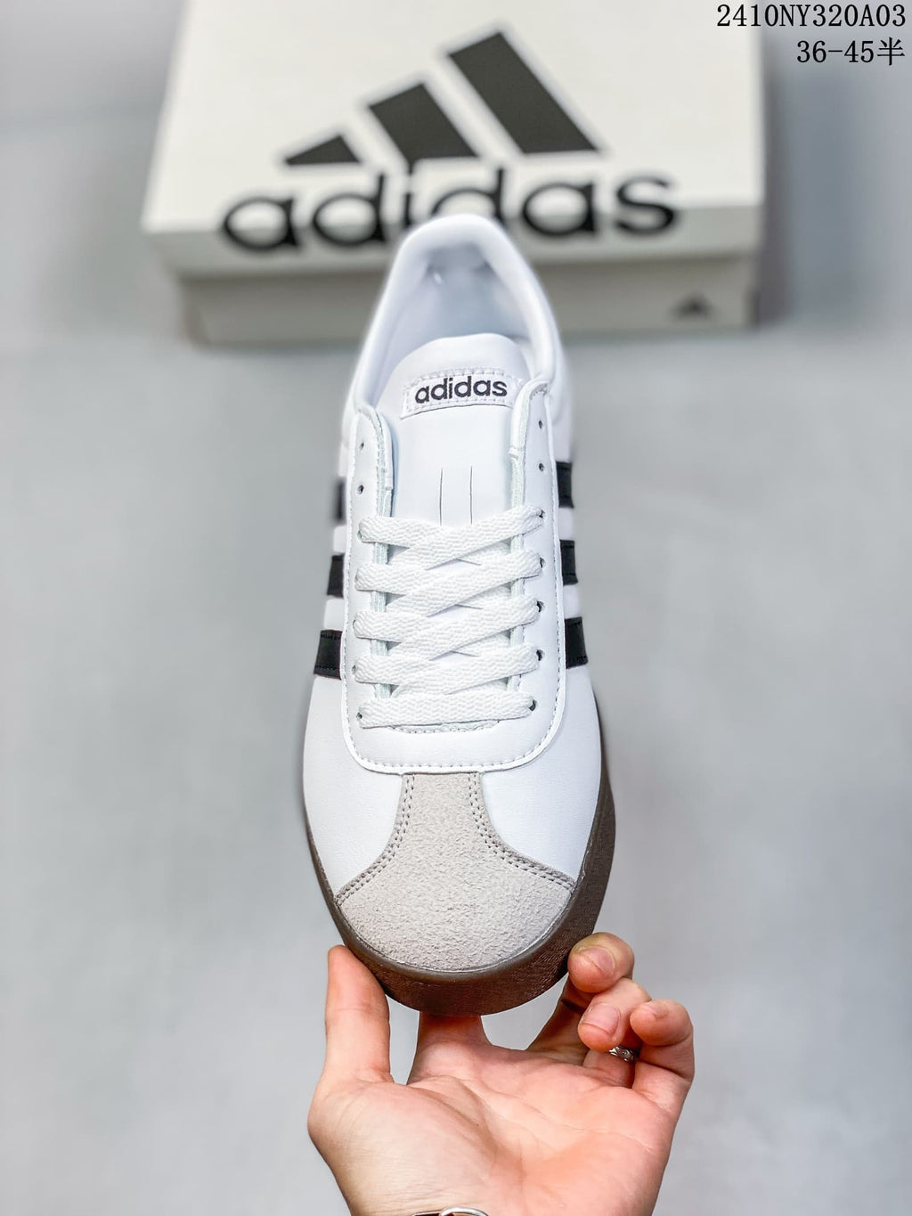 Top view showing the white laces, tongue branding, and contrasting textured toe panel.