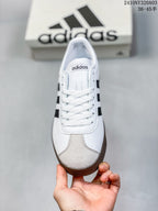 Top view showing the white laces, tongue branding, and contrasting textured toe panel.
