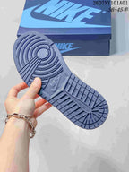 Close-up of the blue patterned outsole of the sneaker
